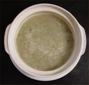 [ Porridge of rice, the adductor muscle and leaf of a japanese radish ]
