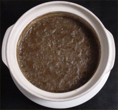 [ Porridge of curry taste containing lentil and meat ]